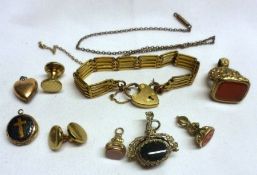 A packet of assorted Jewellery items including Gold Plated Gate Bracelet with padlock, Fobs,