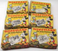 Eight Disneyland Mickey Mouse Jigsaw Puzzles (all unchecked for pieces missing)