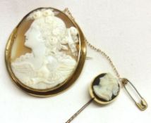 A 19th Century Gilt Metal Framed Shell Cameo Brooch of an Art Nouveau lady with eagle at base (the