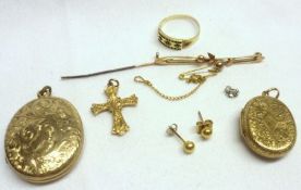 A packet containing two Mixed Metals Victorian Lockets, one with coral mounted cross to the front; a