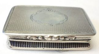 A Victorian Vesta or Snuff Box, of shaped rectangular form with concave sides, engine-turned