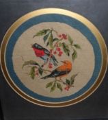 A 20th Century Framed Needlework Picture of two birds amongst foliage, frame 12 ½” x 11 ½”