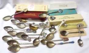 A collection of early/mid-20th Century Souvenir Spoons including eight hallmarked Silver examples (