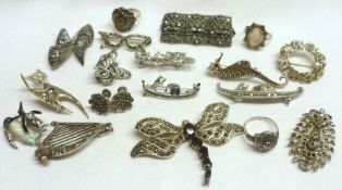 A packet containing eighteen assorted Marcasite Brooches, Rings and Earrings