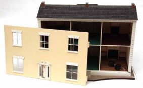 An Edwardian Refurbished Dolls House of timber construction, removable front panel opens to reveal
