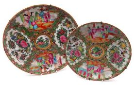 Two Canton famille rose Circular Plates, painted in the typical manner with a compartmentalised