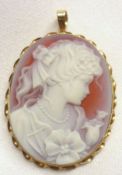 A late 20th Century hallmarked 9ct Gold Framed Hardstone Cameo Brooch of young lady, 37mm x 29mm