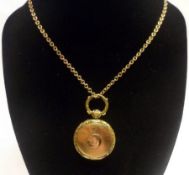 A small Victorian Mixed Metals Circular Hair Panel Locket, with engine-turned decoration and