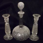 A Dimpled Glass Decanter of shaft and bulb form; together with a pair of decorative facetted Glass