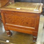 A Victorian Mahogany Commode, the flip top with tooled leather inset, fitted with ceramic pan to a