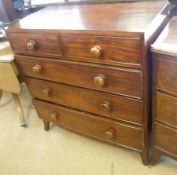 An early 19th Century Chest of Two Short and Three Long Drawers, with turned knob handles,