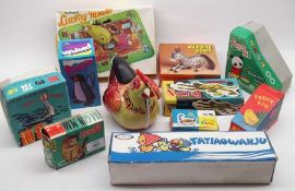 A collection of various Tinplate Toys, circa 1970s, including battery-operated Hen; Swimming Duck;