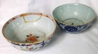 A Chinese Circular Bowl, decorated in underglaze blue with iron red and other coloured detail (rim