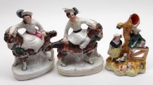 Two Staffordshire Figures of children mounted on goats, painted throughout in colours on a white