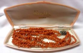 A good Four Strand Stag Coral Necklace, with Marcasite mounted white metal clasp