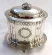A Victorian Electroplated Oval Biscuit Box with integral tray base, the fluted oval body with