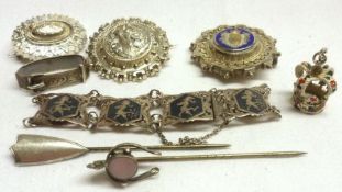 A packet of assorted white metal Jewellery items including, three Brooches, two Pins, Miniature