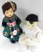 Two All Composition Oriental type Dolls, each unmarked and measuring approximately 15” (2)