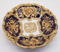 A 20th Century Meissen Circular Plate, relief decorated with gilded foliage on a blue and white