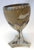 A Victorian Silver and Silver Mounted Ostrich Egg Goblet, the trefoil base emitting three ostrich
