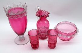 A collection of various Cranberry Glass: a Powder Bowl (lid missing); a small Jug; two Beakers and a