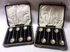 Two Cased Sets each of six George V Bean end Coffee Spoons, Birmingham 1931, makers AP & Co, (2)