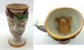 A Staffordshire Frog Mug modelled as a head of Bacchus, decorated with coloured detail, the inner