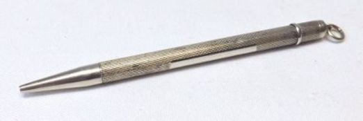 An Elizabeth II Silver encased Bridge Pencil with engine turned detail, Birmingham 1963
