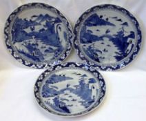 A collection of three Oriental circular Plates, the centres painted in under glazed blue with