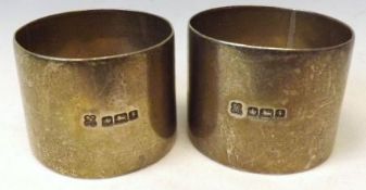 A heavy pair of George V Napkin Rings of plain circular form, Sheffield 1917, makers MH & Co Ltd, (