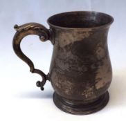 An early George III baluster Half-pint Tankard of plain design having leaf capped double “C”