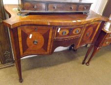 A 19th Century Mahogany and Satinwood small serpentine fronted Sideboard, crossbanded and boxwood