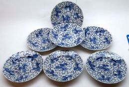 A collection of Kangzsai Wares, all painted in underglaze blue with temple dogs and scrolls etc,