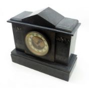 An early 20th Century Slate Cased Timepiece with marble inlay to the architectural case, Arabic