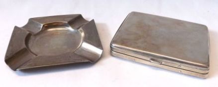 A George V Cigarette Case of plain curved rectangular form, Birmingham 1915; together with a small