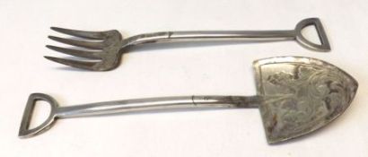 An unusual pair of plated Servers in the form of a Gardeners Fork and Spade, engraved decoration