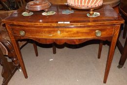 A 19th Century Mahogany Side Table of bow fronted form, crossbanded and boxwood strung top over a