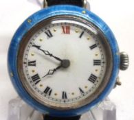 An early 20th Century metal cased Ladies Wristwatch with Roman numerals to an enamel dial, blue