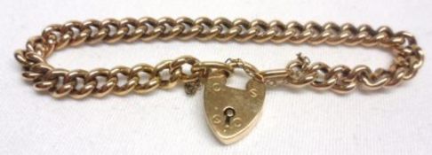 An unmarked yellow metal hollow link Curb Bracelet with padlock, weighing approximately 9gm