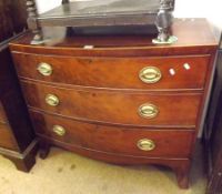 A 19th Century Mahogany Bow Fronted Chest with boxwood strung crossbanded top over three full