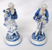 A pair of European Figures of Dandy and his female companion, each wearing period clothing and