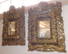 A pair of Ornate Gilded Hardwood Ango-Indian Wall Mirrors, the frames carved with exotic birds and