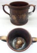 A Staffordshire treacle glazed large two-handled circular Frog Mug, inset in the centre with a large