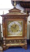 A late 19th Century German Brass Mounted, Oak Cased Mantel Clock by Lenzkirch, of architectural