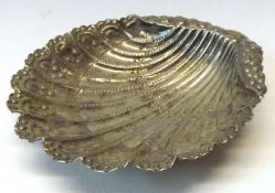 An Edward VII Butter Shell with fluted and embossed detail, supported on three shell feet, 4 ½” x 4”