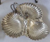 An Electroplated three portion Hors d’oeuvres Dish with fluted shell bowls and rope twist handles,
