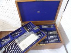 An early 20th Century Oak Cased Canteen of Silver-plated Flatwares in Romney pattern. 100+ items;