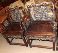 A pair of 20th Century Oriental Hardwood Carver Chairs, profusely inlaid throughout in the Shibayama