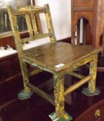 A 19th Century Painted Oak Child’s Chair, with plain rail back, solid seat, plain square supports