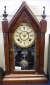 An early 20th Century American Walnut Mantel Clock, Ansonia Clock Co New York, the case with